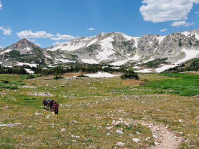 Group of middle schoolers backpacking through Rocky Mountain National Park.