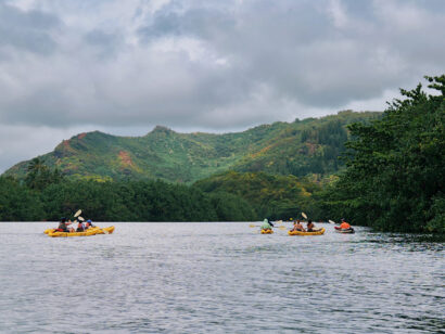 Group of teens sea kayaking in Hawaii.