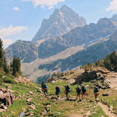 Group of high school students backpacking on the Teton Crest Trail in Wyoming.