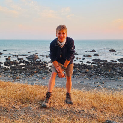 MIddle school boy smiling on the Lost Coast of California.