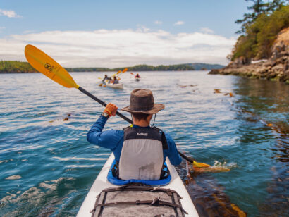 Person sea kayaking in the San Juan Islands.