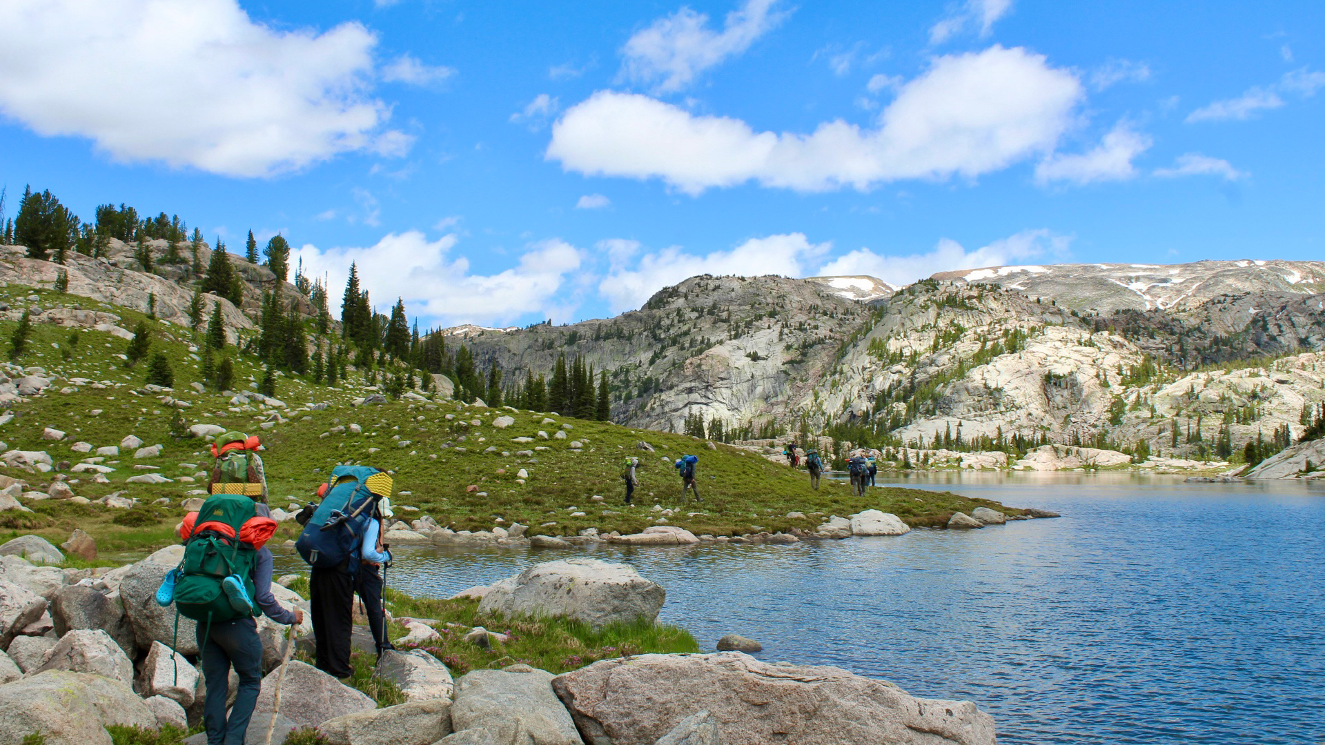 People backpacking in Wyoming on a summer adventure for teens.